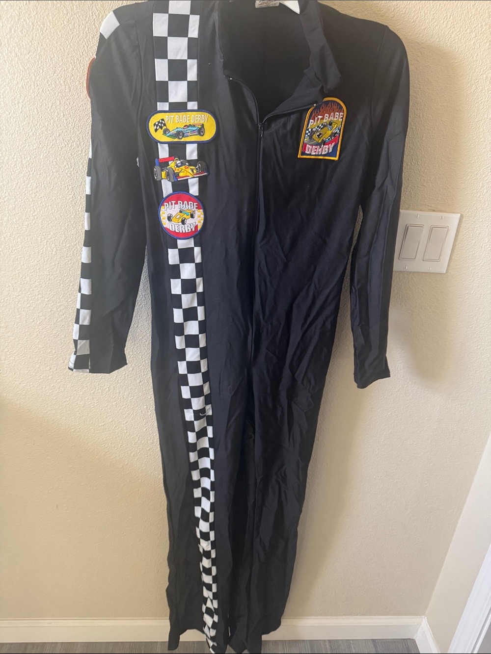 Woman’s Black Checkered Racer One-Piece Bodysuit Costume